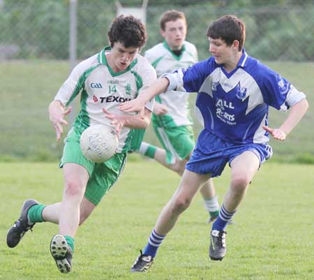 Action from the under 18 league clash between Aodh Ruadh and Four Masters.