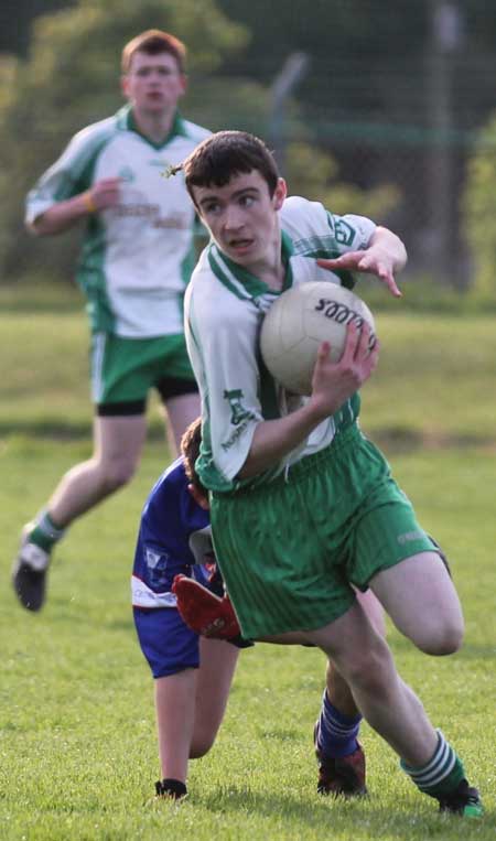 Action from the under 18 league clash between Aodh Ruadh and Four Masters.