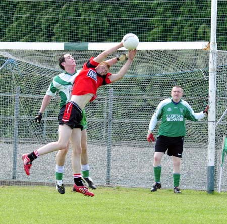 Action from the senior reserve division three match against Urris.