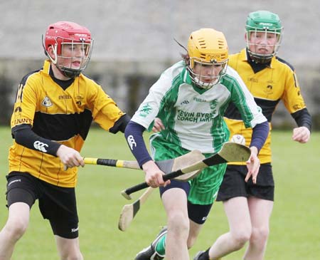 Action from the under 14 hurling game between Aodh Ruadh and Saint Eunan's.