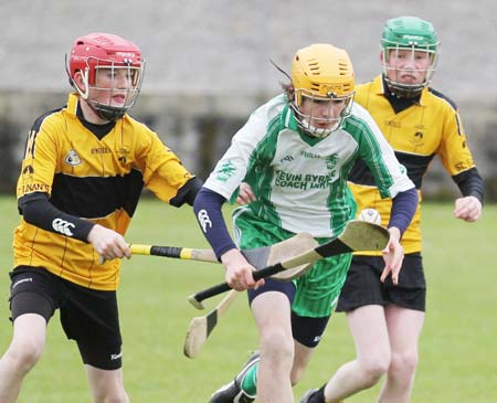 Action from the under 14 hurling game between Aodh Ruadh and Saint Eunan's.