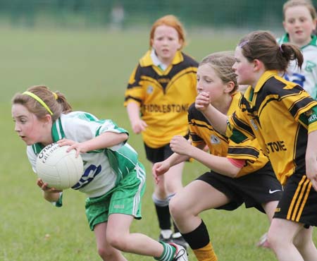 Action from the under 12 girls challenge between Aodh Ruadh and Erne Gaels in Pirc Aoidh Ruaidh.