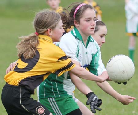 Action from the under 12 girls challenge between Aodh Ruadh and Erne Gaels in Pirc Aoidh Ruaidh.