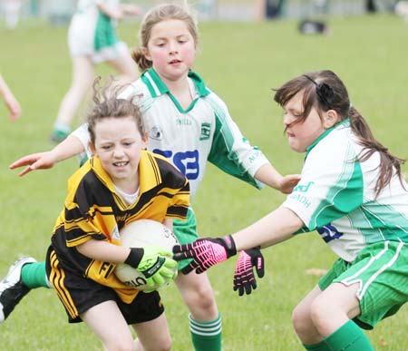 Action from the under 12 girls challenge between Aodh Ruadh and Erne Gaels in Pirc Aoidh Ruaidh.