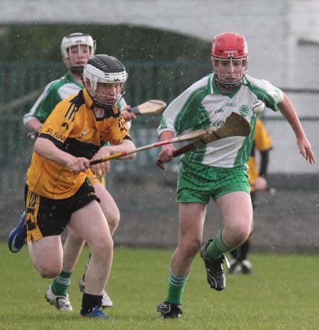 Action from the under 14 hurling game between Aodh Ruadh and Saint Eunan's.