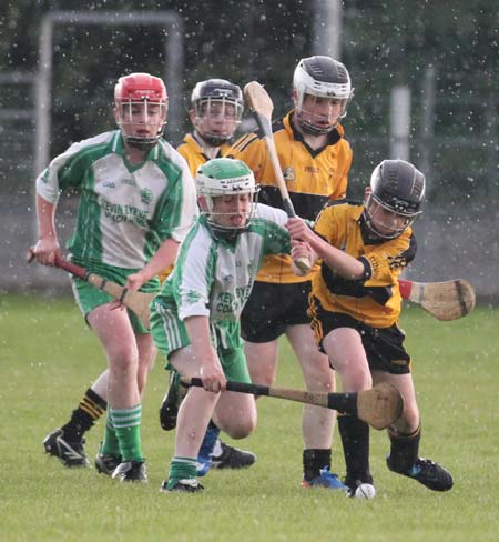 Action from the under 14 hurling game between Aodh Ruadh and Saint Eunan's.