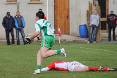 Action from the reserve league match against Naomh Cholmcille.