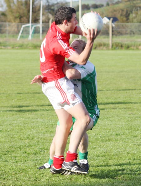 Action from the reserve league match against Naomh Cholmcille.