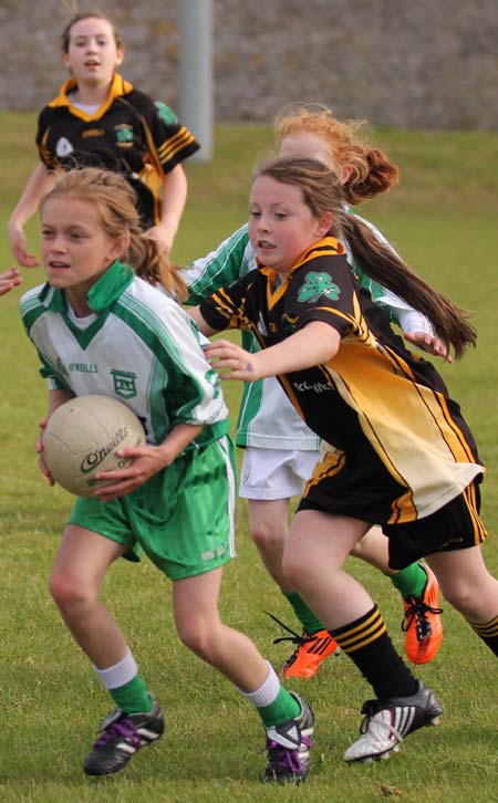 Action from the under 10 girls Willie Rogers tournament in Pirc Aoidh Ruaidh.