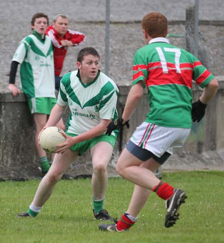 Action from the league match against Carndonagh.