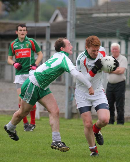 Action from the league match against Carndonagh.