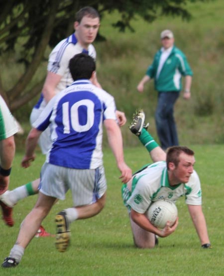 Action from the intermediate championship match against Fanad Gaels.