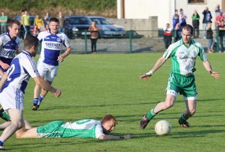 Action from the intermediate championship play-off match against Fanad Gaels.