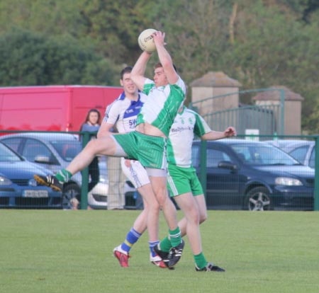 Action from the intermediate championship play-off match against Fanad Gaels.