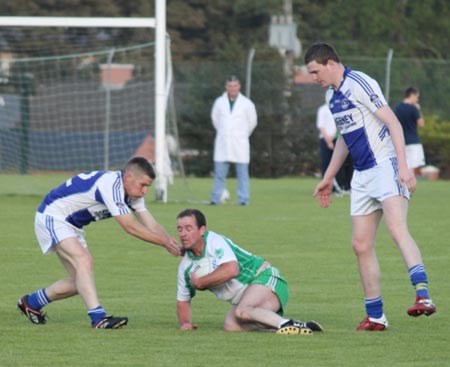 Action from the intermediate championship play-off match against Fanad Gaels.