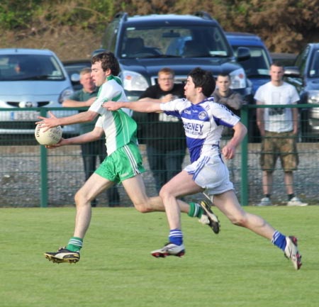 Action from the intermediate championship play-off match against Fanad Gaels.