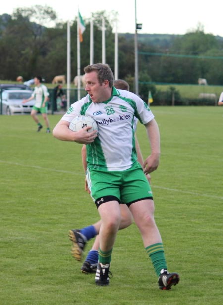 Action from the intermediate championship play-off match against Fanad Gaels.