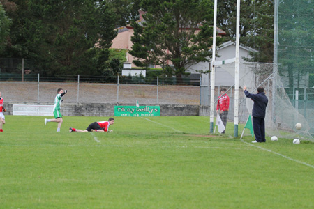 Action from the under 14 match against Dungloe.