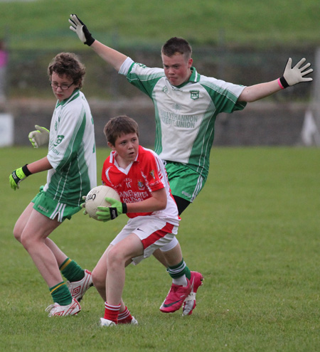 Action from the under 14 match against Dungloe.