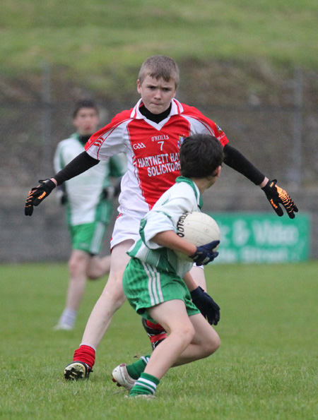 Action from the under 14 match against Dungloe.