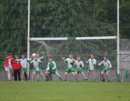 Action from the under 14 match against Dungloe.