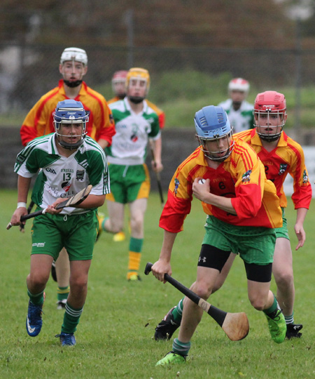 Action from the under 16 hurling league game between Aodh Ruadh and MacCumhaill's.