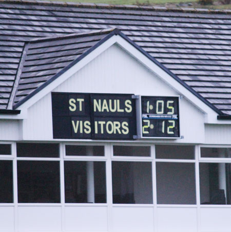 Action from the division three football league match against Saint Naul's.