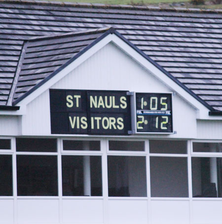 Action from the division three football league match against Saint Naul's.