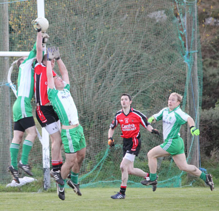 Action from the division three football league match against Urris.