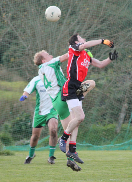 Action from the division three football league match against Urris.