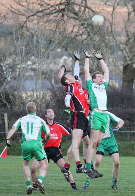 Action from the division three football league match against Urris.