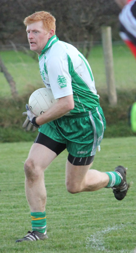 Action from the division three football league match against Urris.