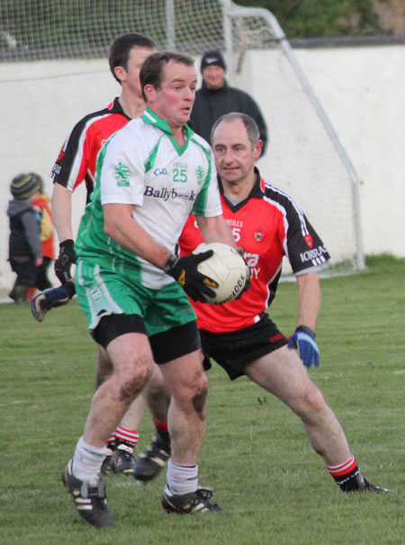 Action from the division three football league match against Urris.