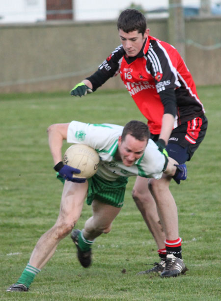 Action from the division three football league match against Urris.