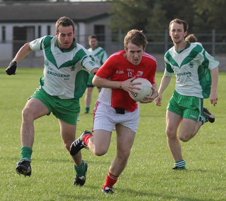 Action from the Senior Reserve Football Division 3 match against Naomh Colmcille.