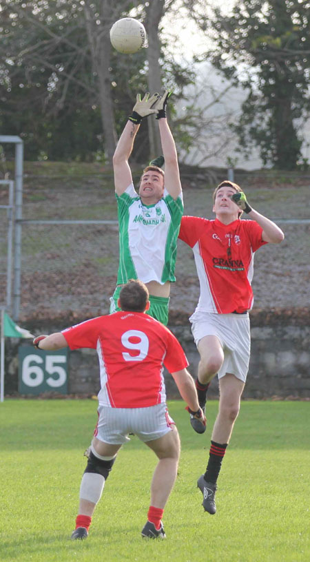 Action from the Senior Reserve Football Division 3 match against Naomh Colmcille.