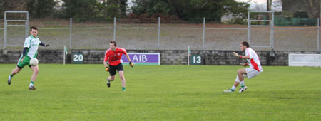 Action from the Senior Reserve Football Division 3 match against Naomh Colmcille.