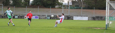 Action from the Senior Reserve Football Division 3 match against Naomh Colmcille.