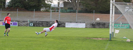 Action from the Senior Reserve Football Division 3 match against Naomh Colmcille.