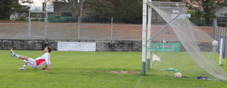 Action from the Senior Reserve Football Division 3 match against Naomh Colmcille.