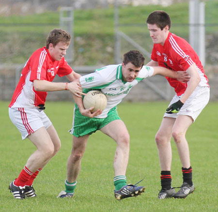 Action from the Senior Reserve Football Division 3 match against Naomh Colmcille.