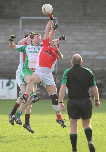 Action from the Senior Reserve Football Division 3 match against Naomh Colmcille.