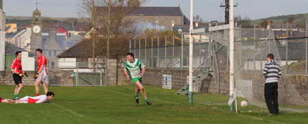 Action from the Senior Reserve Football Division 3 match against Naomh Colmcille.