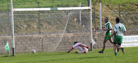 Action from the Senior Reserve Football Division 3 match against Naomh Colmcille.