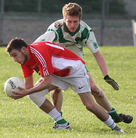 Action from the Senior Reserve Football Division 3 match against Naomh Colmcille.