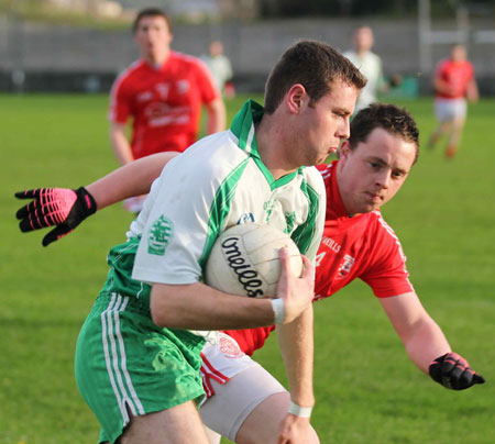 Action from the division three football league match against Naomh Cholmcille.