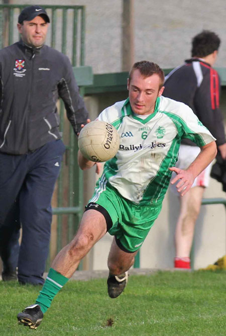 Action from the division three football league match against Naomh Cholmcille.