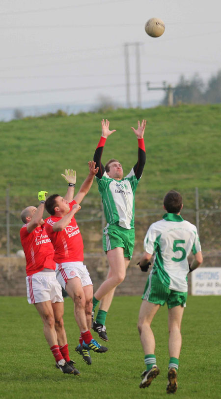 Action from the division three football league match against Naomh Cholmcille.