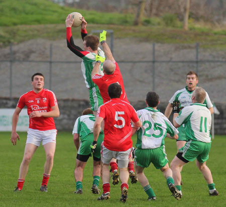 Action from the division three football league match against Naomh Cholmcille.