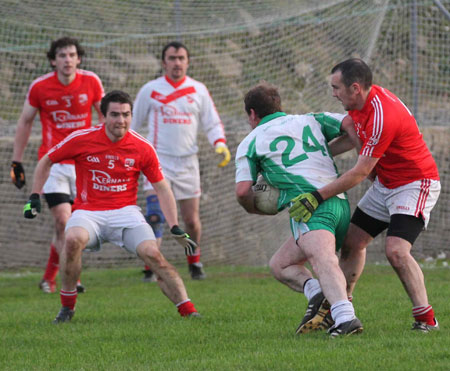 Action from the division three football league match against Naomh Cholmcille.